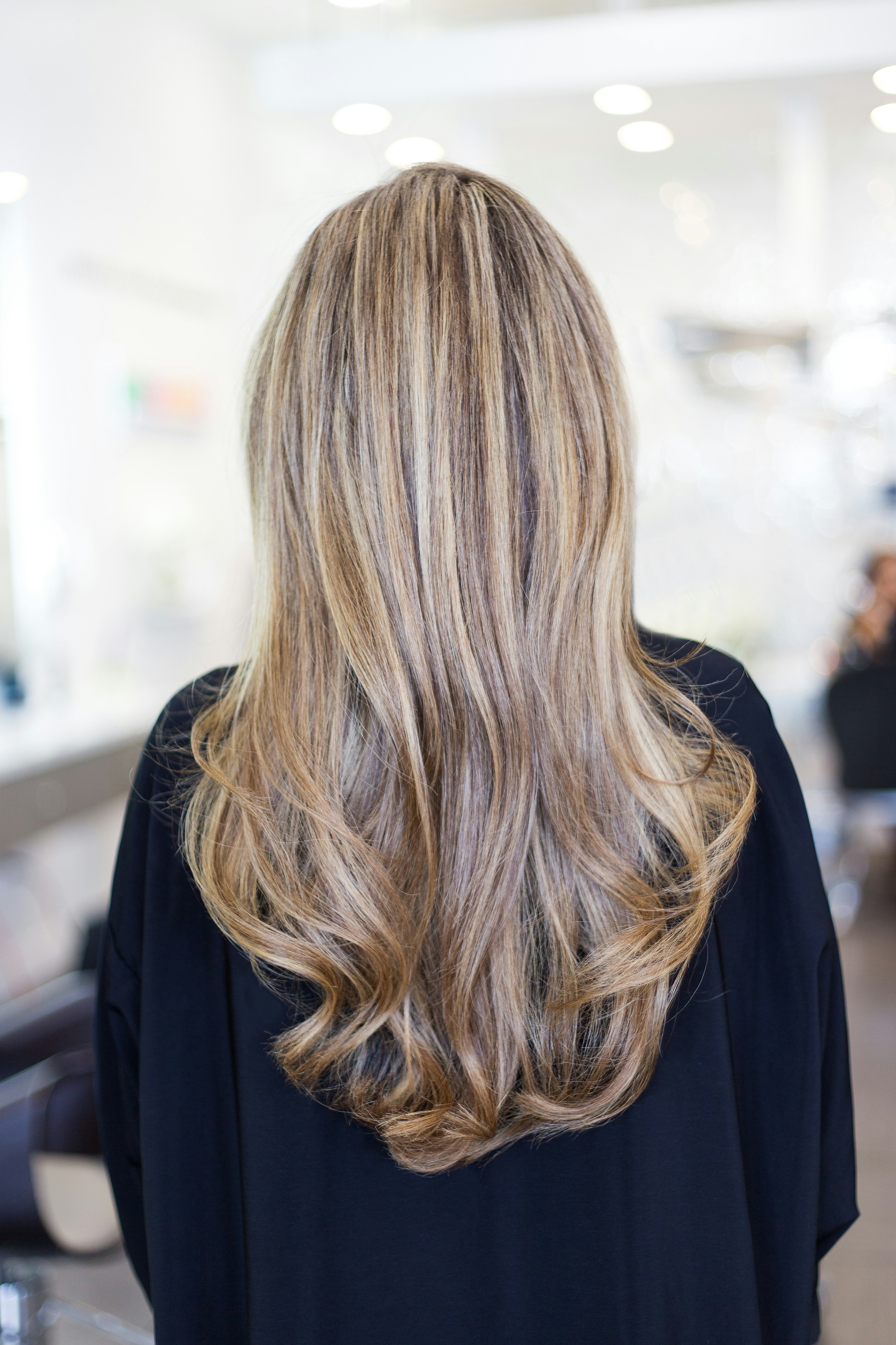 Smooth, glossy finished hair after a salon blowout